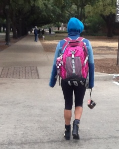 Southern Methodist student is rushing to get out of the cold 27 degree weather. (Maresha Carrie)