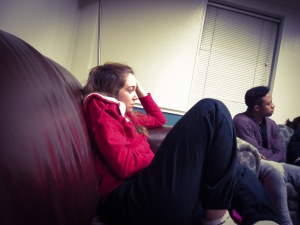 A SMU student is resting in the Moore Hall lounge watching Tv. (Maresha Carrie)